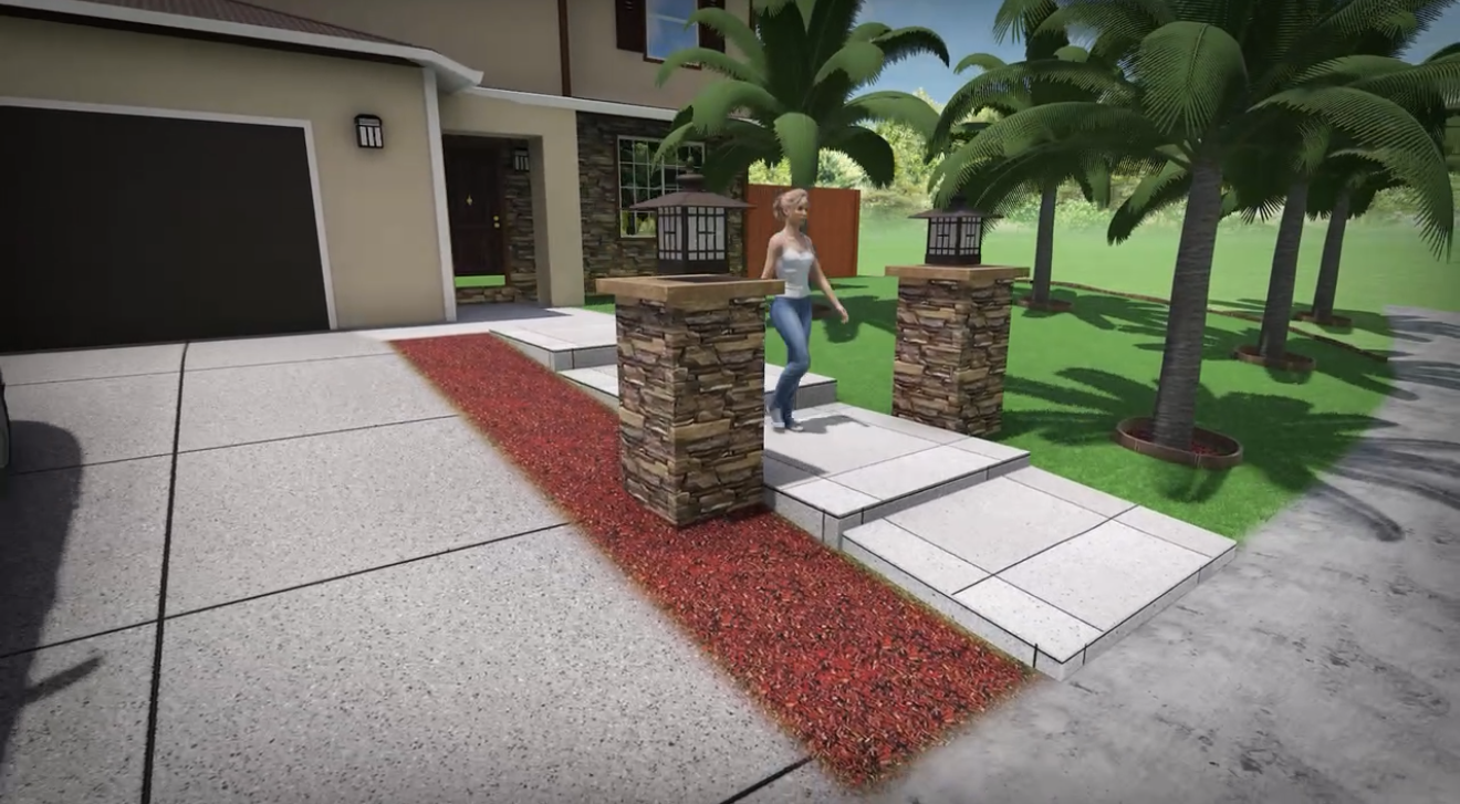 This professionally designed front yard showcases elegant stacked stone columns that frame the entry walkway, complemented by decorative rock, clean concrete finishes, and tropical palm trees. The design creates a welcoming entrance while boosting curb appeal with a balanced blend of texture, structure, and low-maintenance landscaping.
